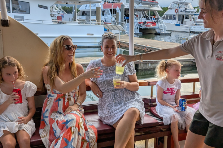 a couple of people that are sitting on a bench