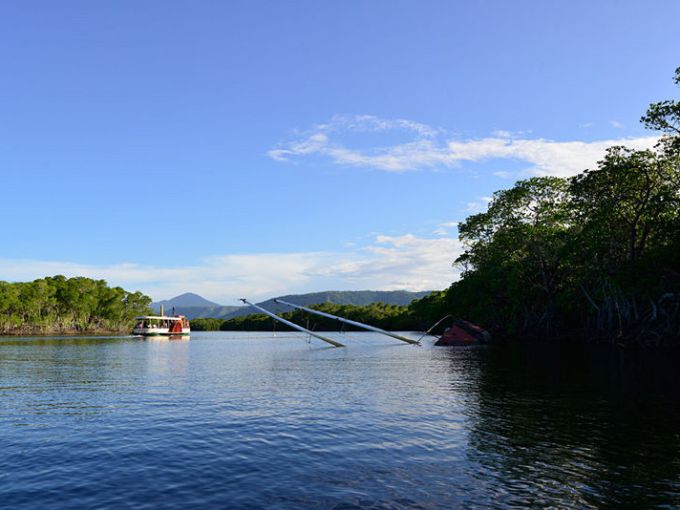 a small boat in a body of water